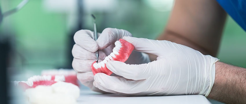 What Causes Broken Dentures